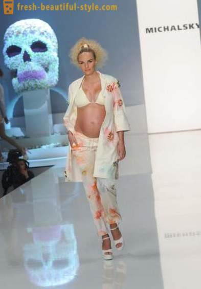 Verontreinigen in een interessante positie: Irina Shayk en andere zwangere model die moedig meenam naar het podium