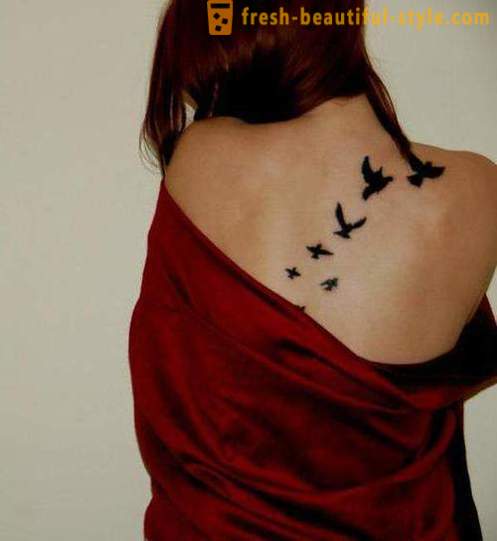 Mooie vrouwelijke tattoo - dat chop en waar sprake is van een beeld